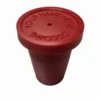 A red wine bottle stopper with the name of a person.