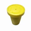 A yellow container sitting on top of a table.